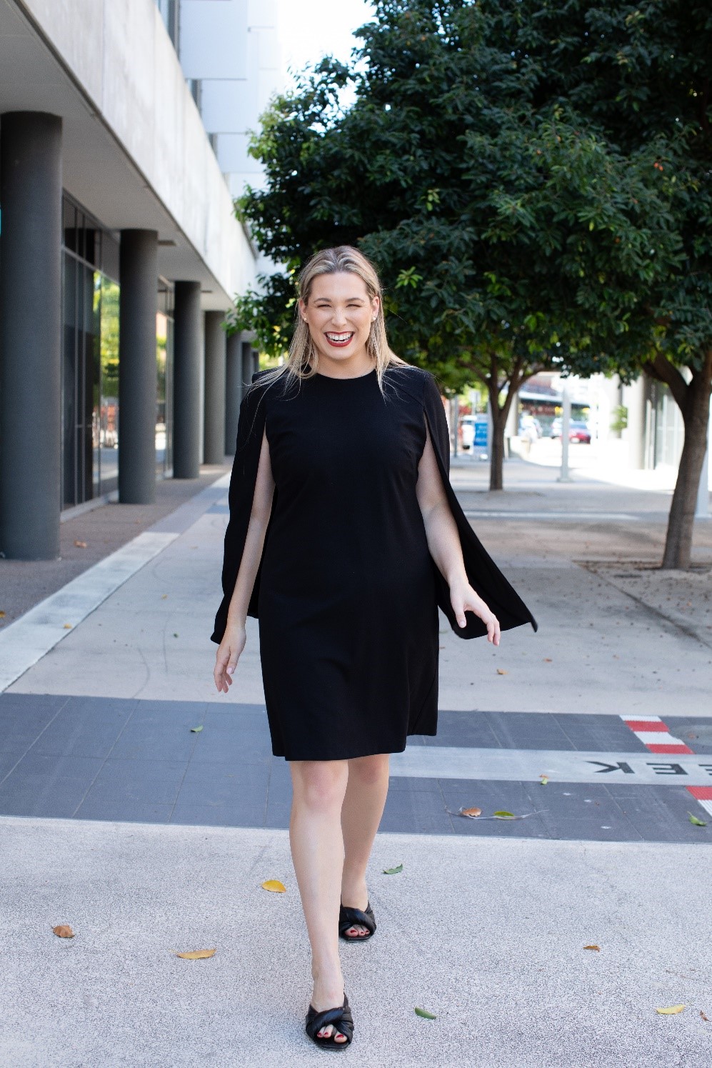 tara lee walking to the office