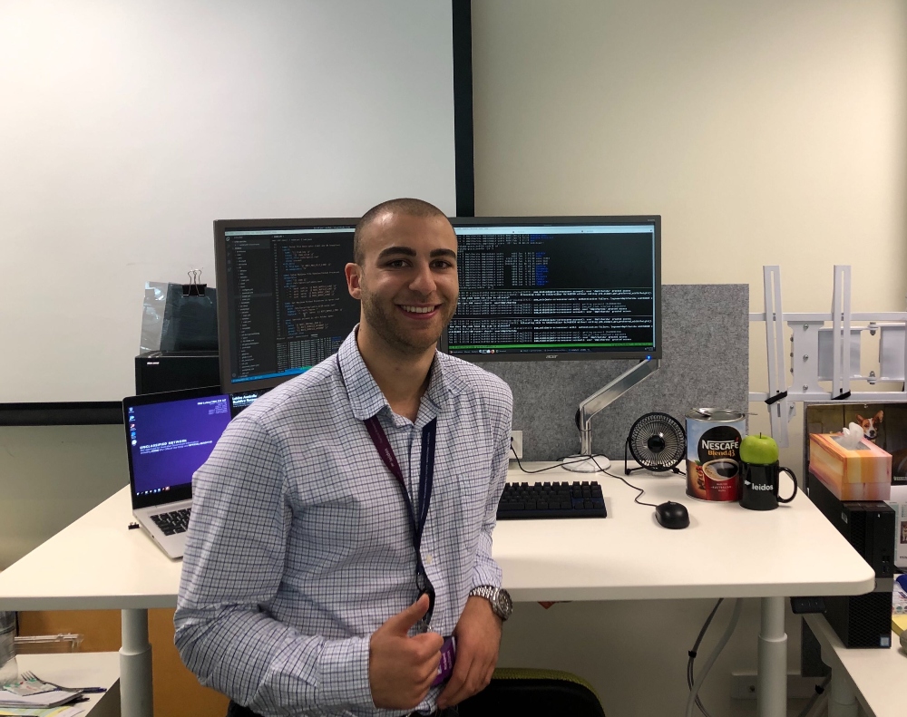Richard Leidos working on his desk